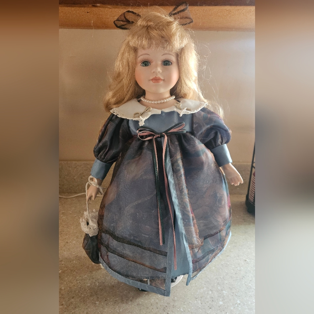 Porcelain Doll with Blue Dress and Blonde Hair